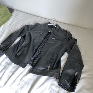 Giulia - Black nappa lamb leather biker jacket four zipper pockets